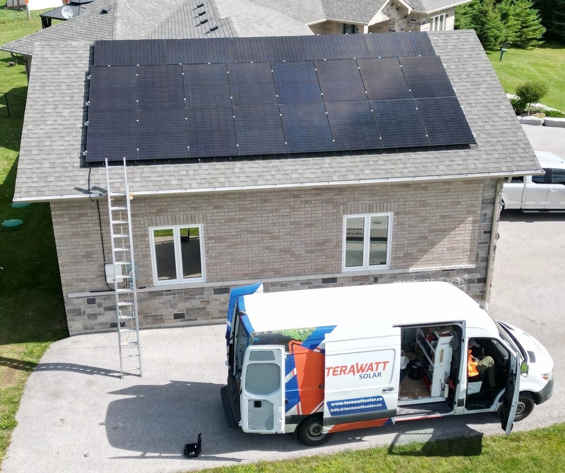 Solar panel installation crew working on a GTA rooftop