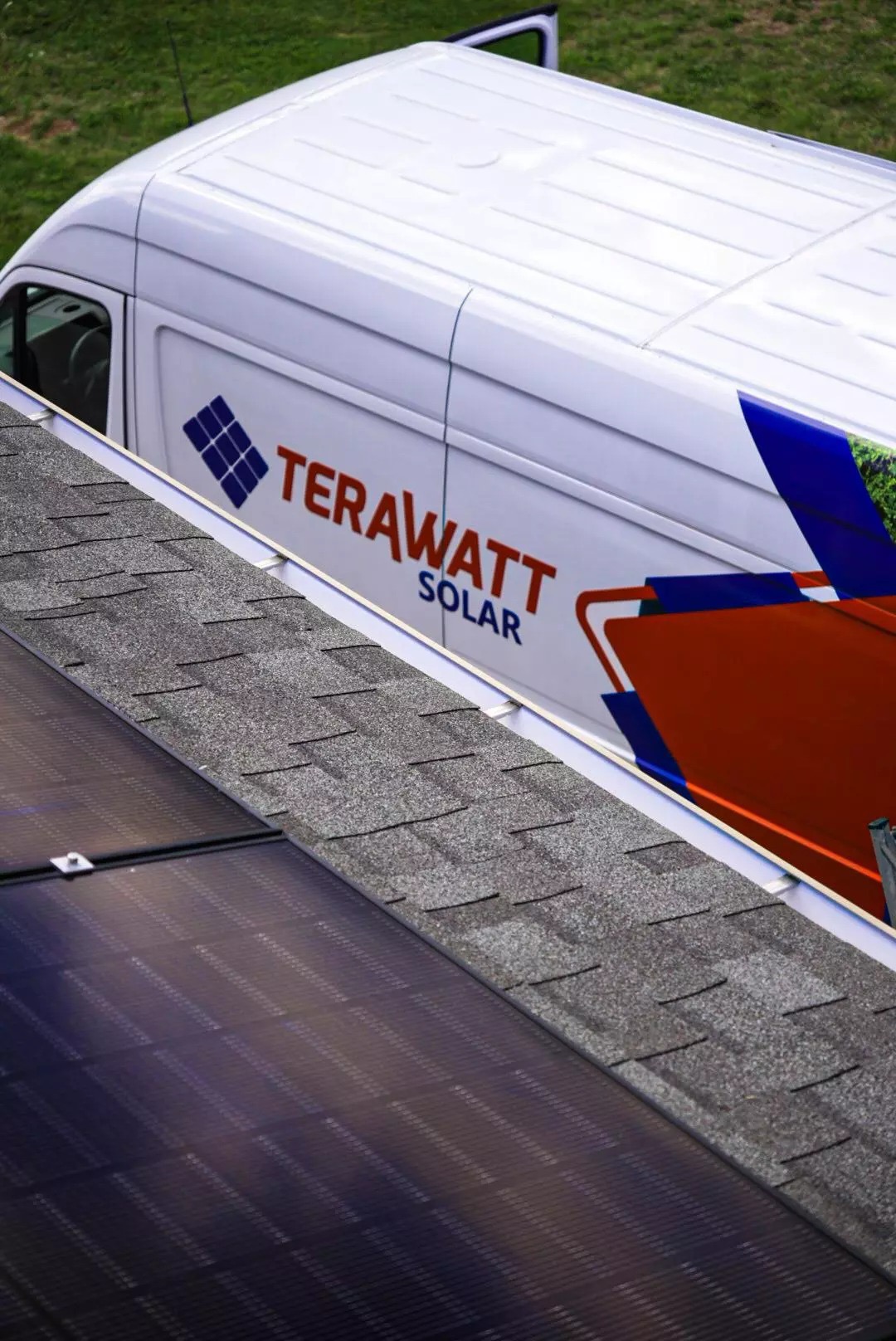 Terawatt Solar branded service van and crew on site for a residential install